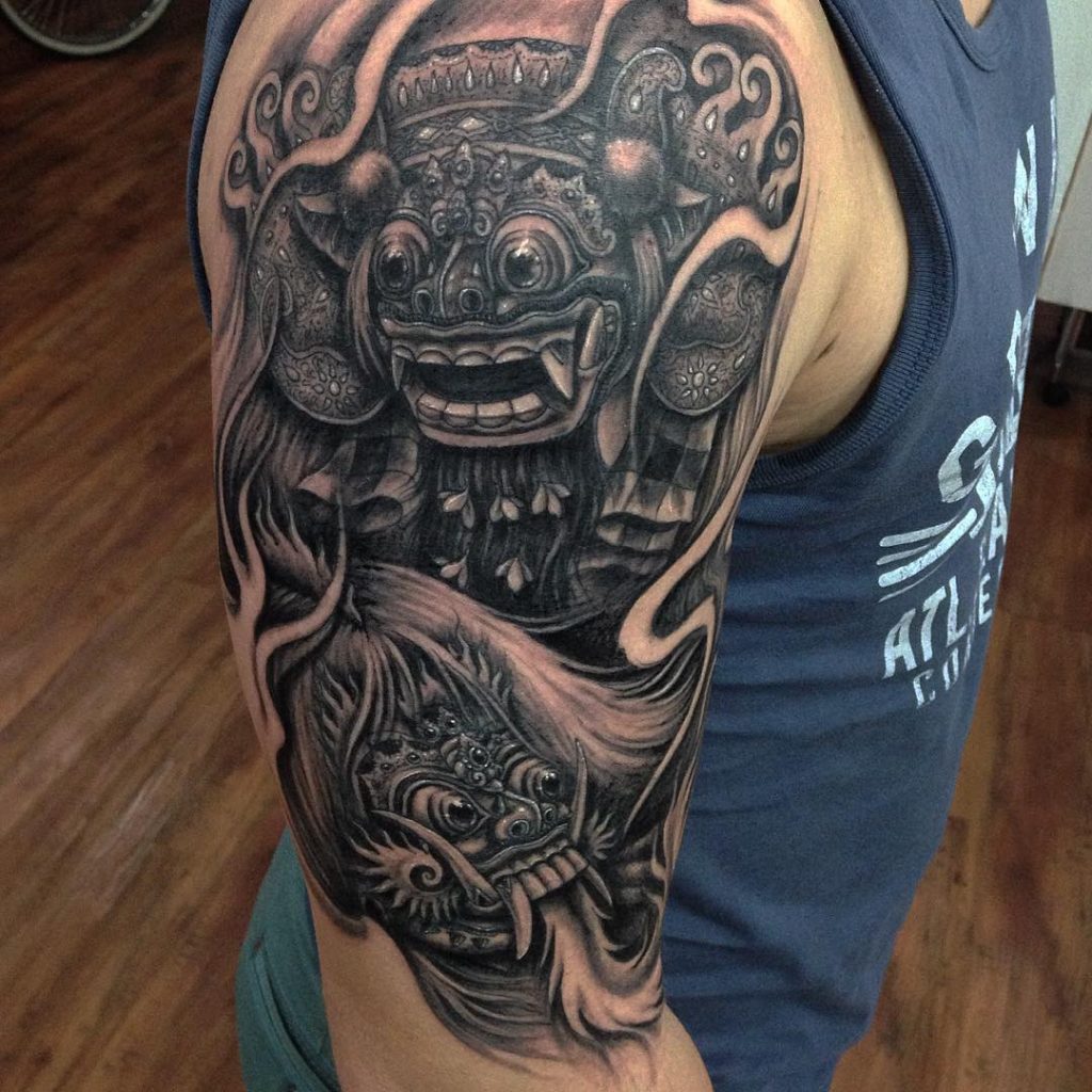 Barong and Rangda sleeve by Nikz Buch Familia Tattoo