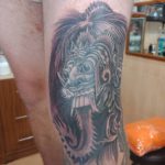 Rangda mask on knee tattoo shared by Redskin Tattoo Studio