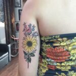 Color tattoo flowers by Buch at Familia Tattoo Bali