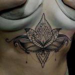 Ornamental sternum tattoo by Prima at MA TATTOO