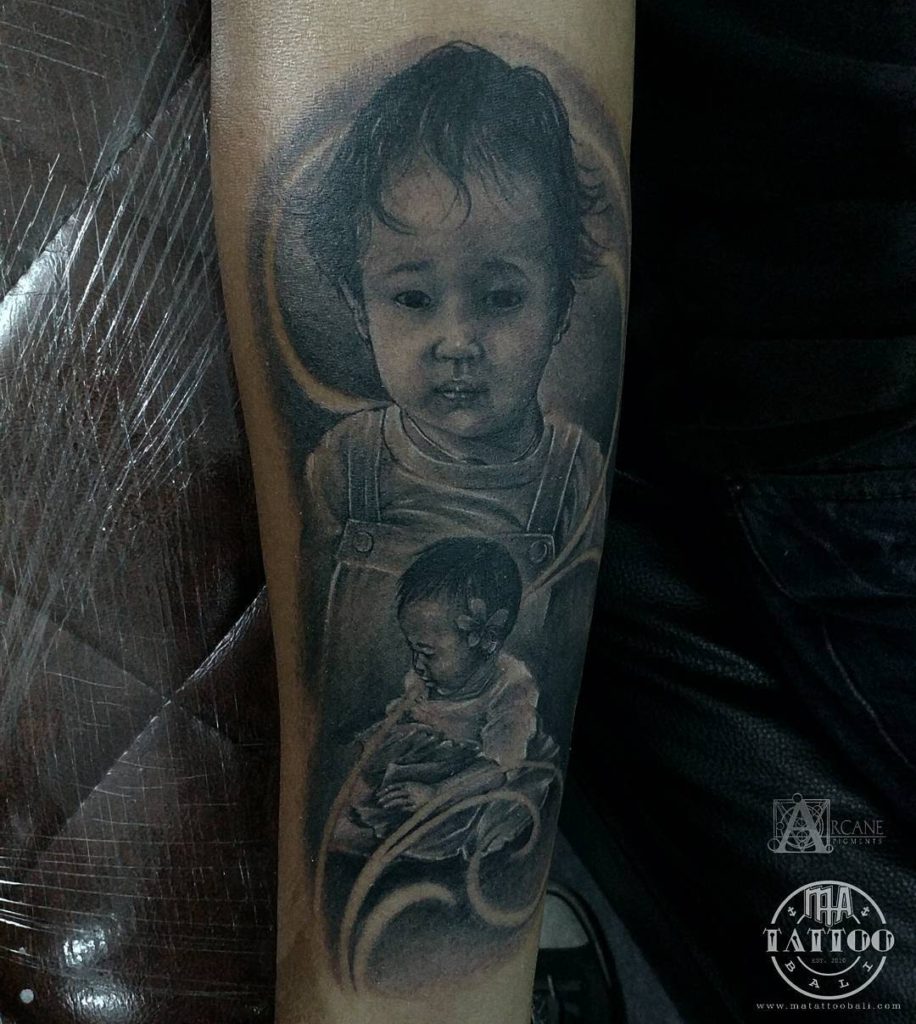 Realist portrait tattoo of child by Prima