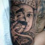 Masked Balinese dancer tattoo by Tridatu Tattoo in Kuta