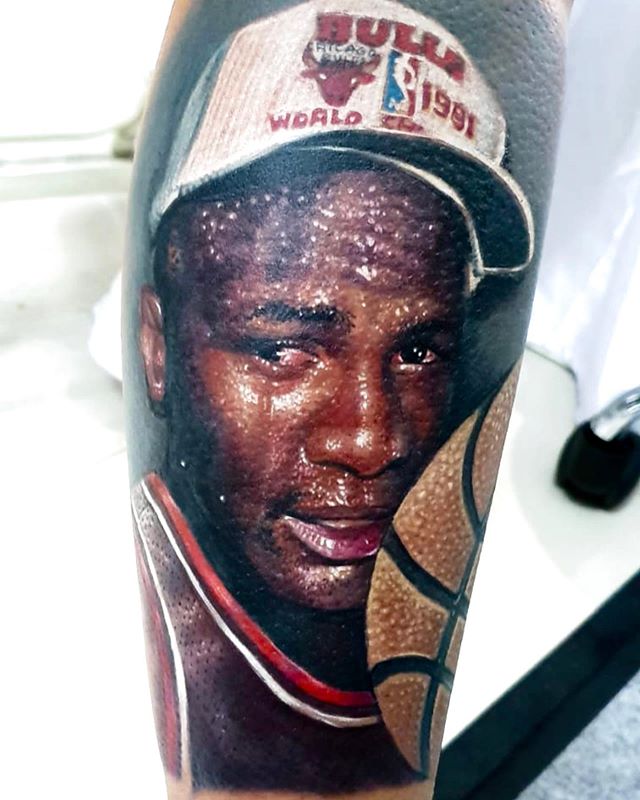 Lolit Made wins Best of Day 2 at Bali Tattoo Expo 2019 for this Michael Jordan tattoo portrait with a basketball and 1991 Bulls hat