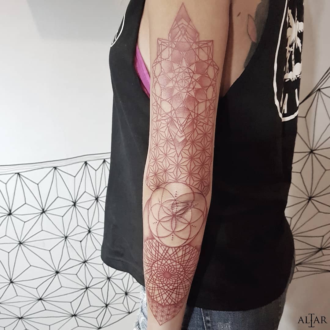 Geometric sleeve tattoo with red ink by @iclawyou Altar Tattoo Berawa