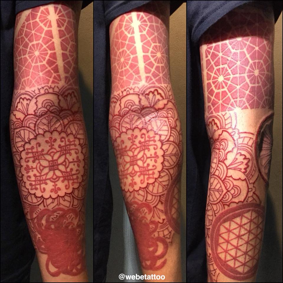 Red sleeve tattoo by Wahyu Webe