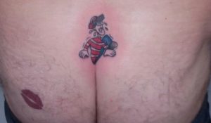 funny tattoo man butt crack