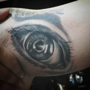 Black and grey eye tattoo by Gendunk13 Bali tattoo artist