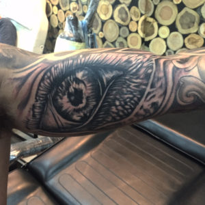 Eye tattoo on upper arm - The Ink Parlour Bali