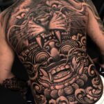 Lion back tattoo and Boma mask from Bali by Dasss Art at Platinum Studio Seminyak for Jorge Mendezvc Sept 2019