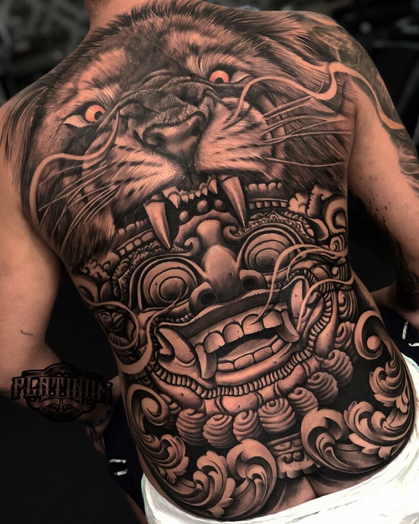 Lion back tattoo and Boma mask from Bali by Dasss Art at Platinum Studio Seminyak for Jorge Mendezvc Sept 2019