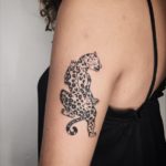 cheetah black arm tattoo