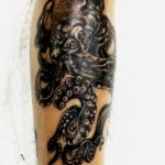 Octopus tattoo by artist Tude Gumer