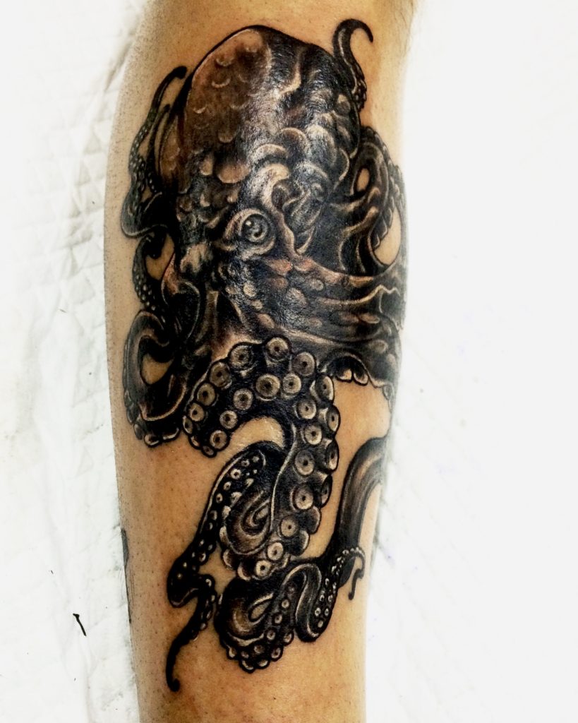 Octopus tattoo by artist Tude Gumer