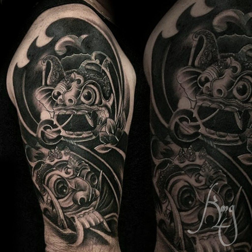 Black and grey Balinese tattoo by Komeng Inked